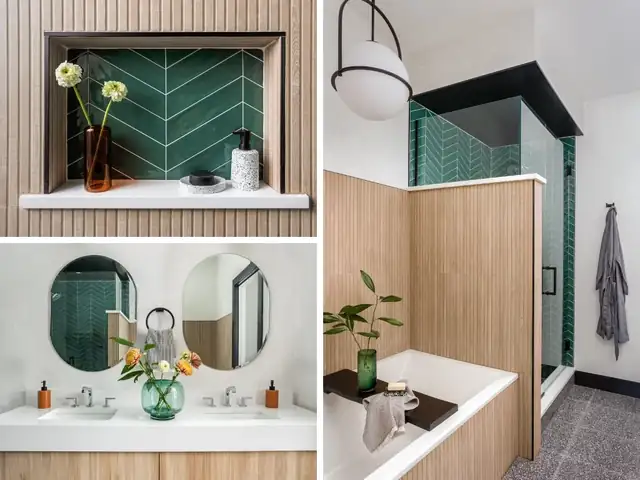 Green herringbone tile shower with glass enclosure and custom built-in niche in a South Loop Chicago townhome bathroom